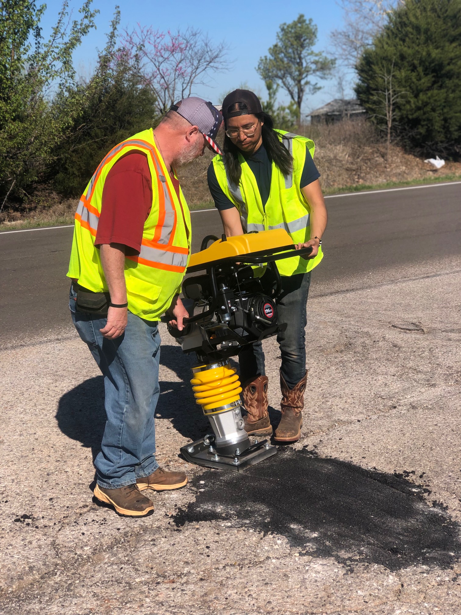 New Street Tamper at Work Filling Potholes City of Harrah